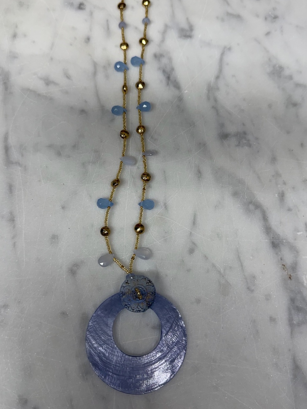 Blue Disc Pendant Necklace with Gold and blue Beaded Chain
